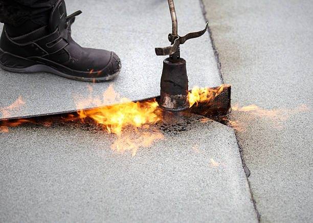 Torch-on waterproofing membrane being heat-sealed